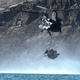 Illustration for article titled US Army helicopter drops an entire boat full of Navy Seals in the sea